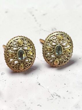 Sterling Silver & 14K gold stud earrings with Blue Topaz of Chapal Fine Jewelry.
